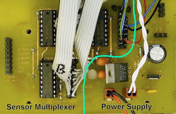 Power supply and 24 inputs from three 74LV4051 multiplexer ICs.