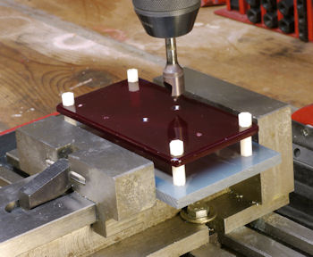 Machining lid while mounted to plate