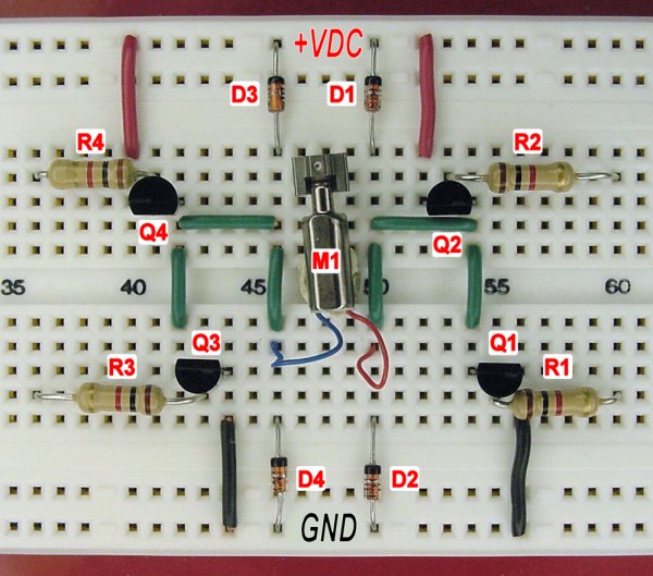Bipolar transistor hbridge motor driver circuit on a solderless breadboard.