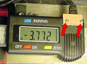 Securing data cable on digital caliper using circuit board and screws