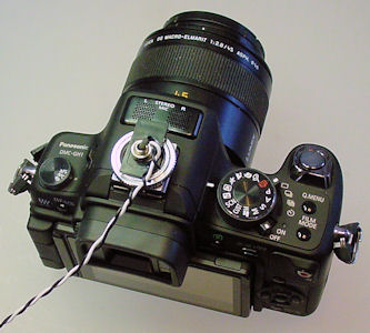 Camera with flash hot shoe connector attached