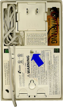Back of Kiddie Nighthawk CO detector showing screw under label
