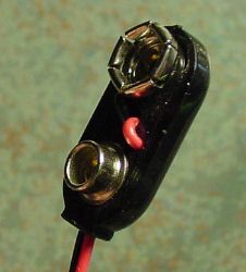 Hard-plastic battery snap