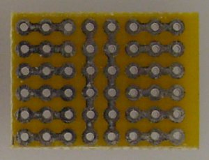 Miniature perf board in leftover space.