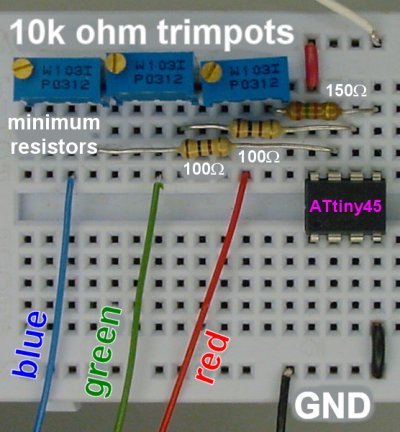 Three trimpots with resistors control the current to red, green, and blue LEDs.