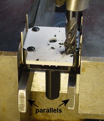 Removing plastic rivets by milling off the tops.