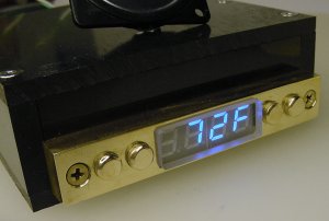 Solid brass display head with four-digit numeric blue LEDs.
