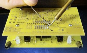 Soldering the boardmount sockets to stack the daughterboard PCB on the robot.