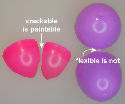 Crackable plastic can be painted. Flexible plastic cannot.