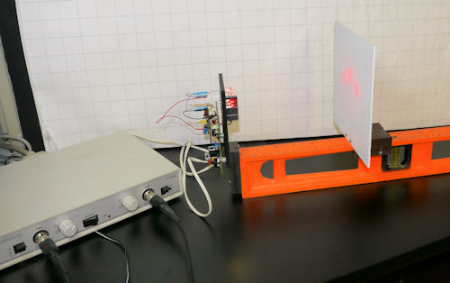 Test apparatus of a Roundabout circuit board oscilloscope and moveable target