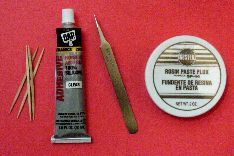 Toothpicks, silicone adhesive, tweezers, and flux paste