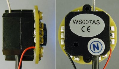 A side view and rear view of a surface-mount LED miniature ring light attached to a wireless video camera.