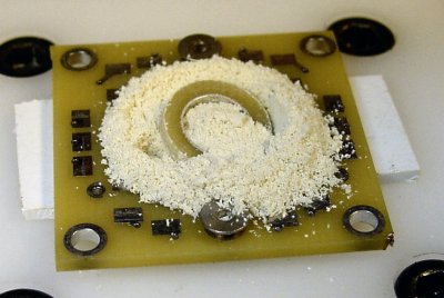 Inner circle of a PCB cut using a 3/32 end mill and a rotary table instead of using a large diameter drill.