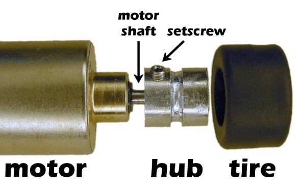 Completed LEGO-replacement metal hub attaches an off-the-shelf miniature DC motor to a rubber LEGO tire.