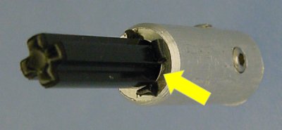 Damage to the sides of the Lego cross axle caused by sharp inside edges.