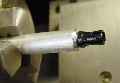 Checking the depth of the Lego cross axle hole.