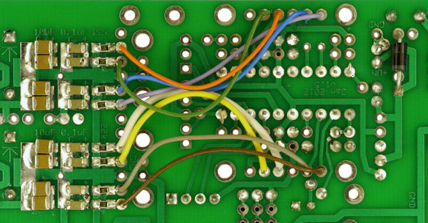 Supplimental wiring and capacitor on bottom of PCB