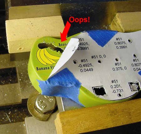 Milling a diagonal tear in a container that was not secured properly..
