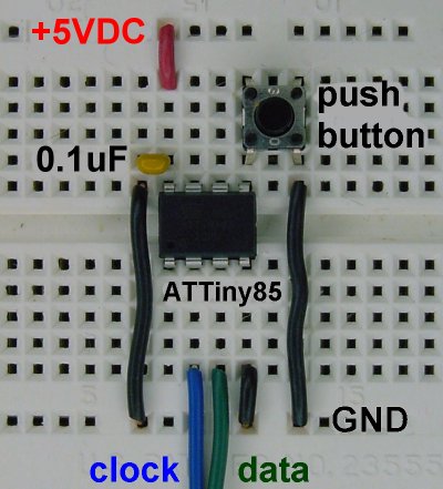 An Atmel ATtiny85 microcontroller on a solderless breadboard for running a multifunction LED display.