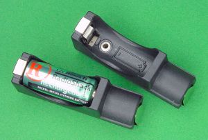 Two N-size to AA adapters (one with N cell installed)