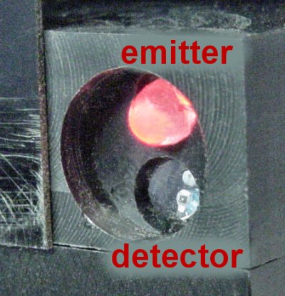 A red LED and phototransistor form a reflective pair to sense the white edge of the mini-sumo ring.