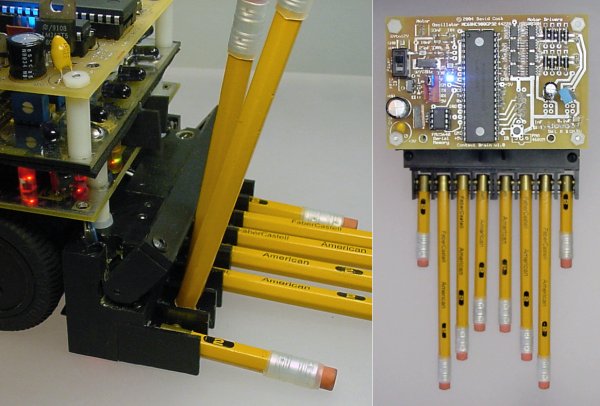 No.2 drops its pencil arms down at the beginning of a mini-sumo robot battle.