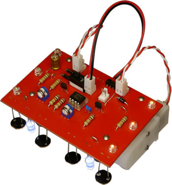 Open Face Sandwich robot with hidden elements designed to focus attention on the red PCB