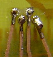 Difficult soldering leads to bad connections and possible bridges