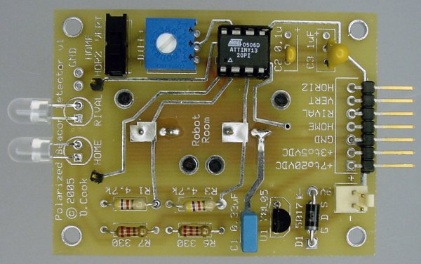 The back of the PCB for the polarized beacon sensors has an Atmel Attiny13 microcontroller, a trimpot, and home/rival switch.
