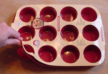 Wilton silicone bakeware 12 cup muffin pan.