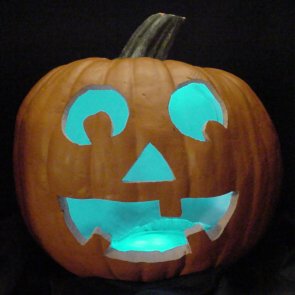 Pumpkin lit with aqua LEDs instead of a candle.