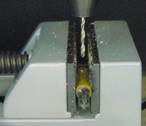 Coupler being drilled