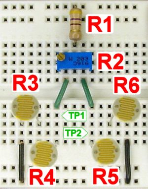 Solderless breadboard with line-following photoresistor sensors