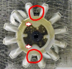 Two set screws (one on each side) keep the shaft centered. The set screws are located in the thickest part of the plastic gear.