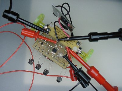 Chicago line-following solar robot undergoing diagnostic surgery via IC hooks.