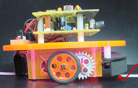 After installing button head screws, the reduced head height causes Roundabout to tilt backwards, exposing the line-following sensor circuit to outside light.