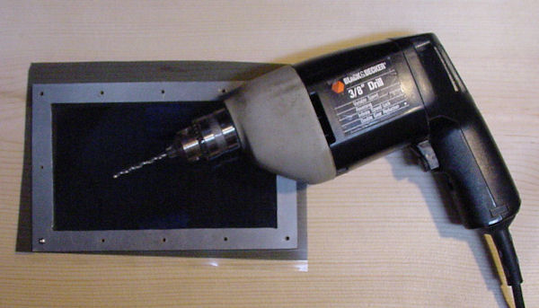 Tape polarizing film drill hole insert screw repeat