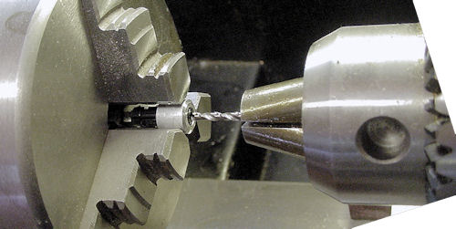 Drilling motor shaft hole with cross axle in place