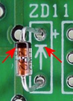 Zener diode inserted such that the band/stripe matches the straight line on the diode symbol on the PCB.