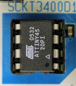 8 pin tiny Atmel AVR chip with dot toward notch in STK500 programmer socket
