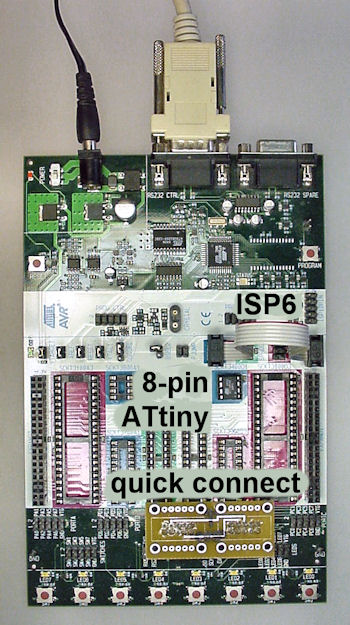 Overhead view of an Atmel AVR STK500 programmer set up for an 8-pin microcontroller.