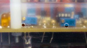 Tiny holes in the robot&rsquo;s shell provide access to adjust trimpots