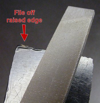 File off any raised edges on scrap that otherwise has a fairly flat side.