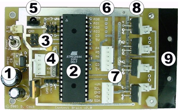 Custom-manufactured robot motherboard with voltage regulator, microcontroller, and four motor drivers.
