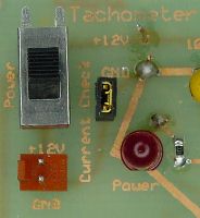 Power switch, connector, indicator, and current-test jumper