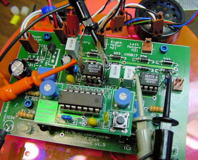 Measuring motor driver chip temperature with thermistors embedded into DIP sockets on a Roundabout printed circuit board.