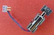 Cell-phone vibrating motor with weight, tack-welded mounting clip, and two-pin connector