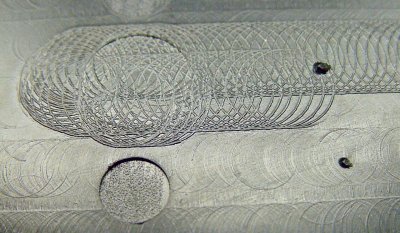 Milling-machine tool marks inside the case lid.