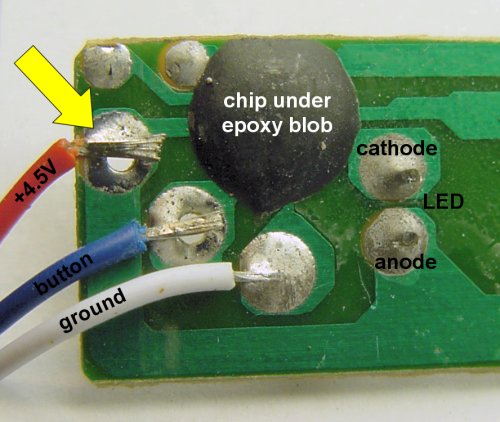 Underside of stop-light circuit board shows black epoxy covering the chip.