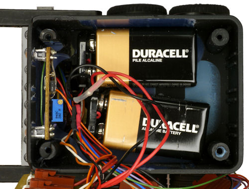 Battery compartment holds two 9 volts